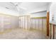 Spacious bedroom with a closet and natural light from the windows and is ready for remodel at 5921 Denver Ne St, St Petersburg, FL 33703