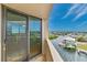 Balcony view showcases serene waterfront views, perfect for relaxation and outdoor dining at 6035 Sea Ranch Dr # 612, Hudson, FL 34667