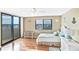 Cozy bedroom featuring ample natural light and coastal-themed decor at 6035 Sea Ranch Dr # 612, Hudson, FL 34667