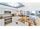 Modern kitchen features granite countertops, stainless steel appliances and water views at 6035 Sea Ranch Dr # 612, Hudson, FL 34667