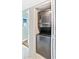 Space-saving laundry featuring a stacked washer and dryer for added convenience at 6035 Sea Ranch Dr # 612, Hudson, FL 34667