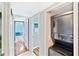 Practical laundry closet including a convenient stacked washer and dryer unit at 6035 Sea Ranch Dr # 612, Hudson, FL 34667