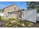 Backyard view of house featuring storage shed, AC unit, and grass at 6616 Northhaven Ct, Riverview, FL 33578