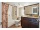 Bathroom featuring granite countertops, wood cabinets, and a tub with a shower at 6616 Northhaven Ct, Riverview, FL 33578