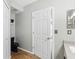 This bathroom features a black toilet, and a light-colored countertop over the sink area at 6616 Northhaven Ct, Riverview, FL 33578