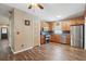 This kitchen is equipped with stainless steel appliances and wooden cabinets at 6616 Northhaven Ct, Riverview, FL 33578