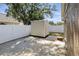 View of storage shed, concrete pad, and fenced yard at 6616 Northhaven Ct, Riverview, FL 33578