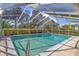 This inviting screened pool has golf course views and a nearby neighborhood at 6790 Burning Tree Dr, Seminole, FL 33777