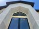 Close-up of the front entrance featuring a peaked roofline and modern stone columns at 812 W Braddock St, Tampa, FL 33603