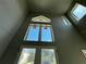 Interior view of the soaring ceilings, clerestory window and upper-level windows above the front door at 812 W Braddock St, Tampa, FL 33603