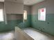 A future kitchen features drywall, new windows, and rough-in plumbing, ready for customization at 812 W Braddock St, Tampa, FL 33603