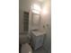 Clean bathroom with vanity sink, mirrored cabinet, and toilet at 844 67Th S St, South Pasadena, FL 33707