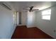 Bright bedroom features modern ceiling fan, mini-split air conditioner, and closet at 844 67Th S St, South Pasadena, FL 33707