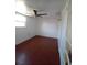 Bright bedroom features modern ceiling fan, mini-split air conditioner, and window at 844 67Th S St, South Pasadena, FL 33707