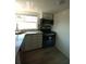 Efficient kitchen design with modern appliances and ample natural light at 844 67Th S St, South Pasadena, FL 33707