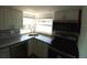 Beautiful kitchen featuring granite counters and a tiled backsplash at 844 67Th S St, South Pasadena, FL 33707