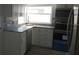 Stylish kitchen with new appliances and stone countertops at 844 67Th S St, South Pasadena, FL 33707