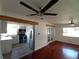 Inviting living room next to updated kitchen and wood floors at 844 67Th S St, South Pasadena, FL 33707