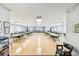 Spacious meeting room with tile flooring, ample seating, and a clean, well-lit environment at 854 Sky Loch N Dr, Dunedin, FL 34698