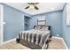 Comfortable bedroom featuring wood floors and a closet at 8648 78Th Pl, Seminole, FL 33777