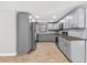 Modern kitchen featuring stainless steel appliances, ample cabinets and butcher block countertops at 8648 78Th Pl, Seminole, FL 33777