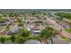 Aerial view of a home with lake view at 1023 Springtime Dr, Holiday, FL 34691