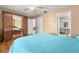 Bedroom showcasing a comfortable bed and an ensuite bathroom at 1023 Springtime Dr, Holiday, FL 34691