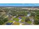 Aerial view of a single Gathering home with a spacious yard in a serene suburban setting at 10262 Maybird Ave, Weeki Wachee, FL 34613