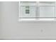 Bedroom features neutral walls, trim and window at 11423 Shoreline Trl, Parrish, FL 34219