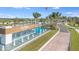 The Del Webb Bayview community entrance features water fountains, landscaping, and a decorative sign at 11423 Shoreline Trl, Parrish, FL 34219