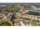 Aerial view of the community highlighting the property's prime location near a pond at 11449 Crestlake Village Dr, Riverview, FL 33569