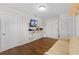 Bright bonus room with updated flooring, recessed lighting, and neutral color palette at 11449 Crestlake Village Dr, Riverview, FL 33569