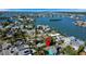 An aerial view shows the property's waterfront neighborhood and its proximity to the open bay at 1214 Bay Shore Blvd, Indian Rocks Beach, FL 33785