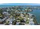Wonderful view of waterfront properties in a lively neighborhood with green landscaping and serene waters at 1214 Bay Shore Blvd, Indian Rocks Beach, FL 33785
