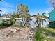 Backyard with a shed and room for landscaping; the backyard is ready to be redesigned at 1214 Bay Shore Blvd, Indian Rocks Beach, FL 33785