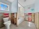 Bathroom featuring a soaking tub, shower, and toilet, still requiring renovation to be completed at 1214 Bay Shore Blvd, Indian Rocks Beach, FL 33785