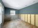 This bedroom offers ample space with unfinished walls and flooring at 1214 Bay Shore Blvd, Indian Rocks Beach, FL 33785