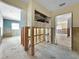 This hallway offers ample space and unfinished walls and flooring at 1214 Bay Shore Blvd, Indian Rocks Beach, FL 33785