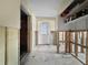 This hallway offers ample space and unfinished walls and flooring at 1214 Bay Shore Blvd, Indian Rocks Beach, FL 33785