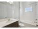 Bathroom featuring a tub and shower combination and a modern vanity with a sink at 13052 Homestead Ln, Parrish, FL 34219