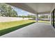 View of patio area, landscaping, and fenced in backyard at 13052 Homestead Ln, Parrish, FL 34219