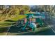 Vibrant community playground with slides, climbing structures, and cushioned ground cover provides a fun and safe play area at 15229 Wind Whisper Dr, Odessa, FL 33556