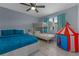 Comfortable bedroom with bunk beds, playful tent, and a cozy atmosphere perfect for  at 1628 12Th Sw St, Largo, FL 33778