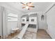 The bedroom features a bunk bed with a slide, a small table with a chair, and a window at 1648 Arbor Dr, Clearwater, FL 33756