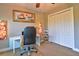 Bright bedroom with view of a pond, desk, and ceiling fan at 1704 Via Palermo St, Plant City, FL 33566