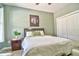 Comfortable bedroom featuring natural light, a ceiling fan and carpeted flooring at 1704 Via Palermo St, Plant City, FL 33566