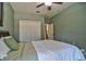 Comfortable bedroom features a ceiling fan and a closet at 1704 Via Palermo St, Plant City, FL 33566