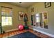 This home gym features hard wood floors and workout equipment at 1704 Via Palermo St, Plant City, FL 33566