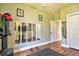 This home gym features hard wood floors and workout equipment at 1704 Via Palermo St, Plant City, FL 33566