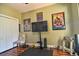 This home gym features hard wood floors, a closet, and workout equipment at 1704 Via Palermo St, Plant City, FL 33566
